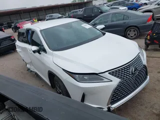 2020 Lexus RX 350 z VIN 2T2AZMAA7LC171391, wystawiony jako IAAI lot #41906891 z przebiegiem 52 248 mil mil oraz . Historia ofert i sprzedaży dostępna na DreamBid. Obrazek 1.