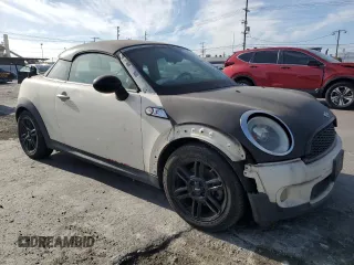 2013 MINI Coupe S z VIN WMWSX3C55DT772606, wystawiony jako Copart lot #43653845 z przebiegiem 39 474 mil mil oraz Czysty tytuł • Clean title. Historia ofert i sprzedaży dostępna na DreamBid. Obrazek 4.