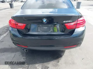 2014 BMW 4 Series 428i with VIN WBA3N7C55EF719504, listed as a IAAI auction lot 41403957 with 98,882 mi miles and . Bid and sale history available at carsss.com. Image 16.