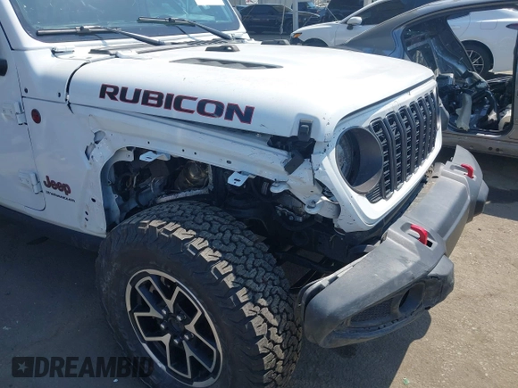 2024 Jeep Wrangler Rubicon with VIN 1C4PJXFG1RW300794, listed as a IAAI auction lot 42784578 with 22,652 mi miles and . Bid and sale history available at DreamBid. Image 6.