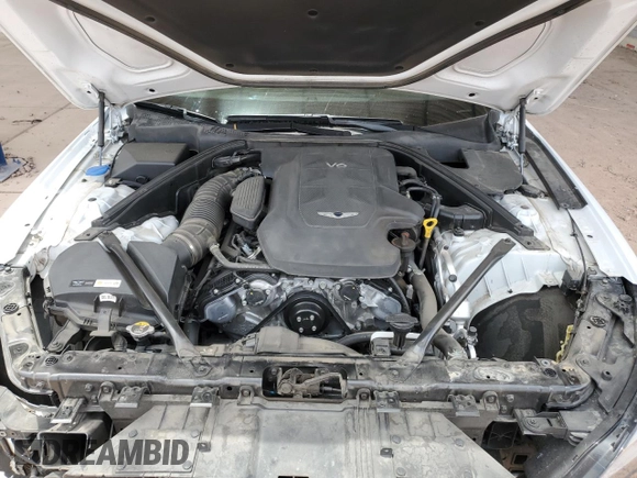 2018 Genesis G80 3.8L z VIN KMHGN4JE3JU285266, wystawiony jako Copart lot #58053355 z przebiegiem 69 335 mil mil oraz Szkoda całkowita • Salvage title. Historia ofert i sprzedaży dostępna na DreamBid. Obrazek 11.