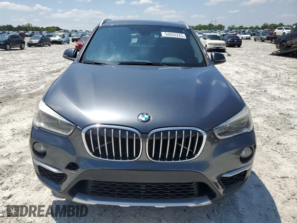 2017 BMW X1 sDrive28i with VIN WBXHU7C32HP925374, listed as a Copart auction lot 54820225 with 136,708 mi miles and Clean Title. Bid and sale history available at carsss.com. Image 5.
