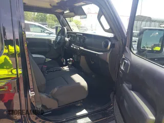 2023 Jeep Wrangler Sport S with VIN 1C4HJXDN5PW671167, listed as a IAAI auction lot 42176127 with 1,230 mi miles and . Bid and sale history available at DreamBid. Image 5.