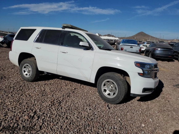 2016 Chevrolet Tahoe Commercial with VIN 1GNSKFEC2GR266027, listed as a Copart auction lot 84628234 with 135,689 mi miles and Salvage Title. Bid and sale history available at carsss.com. Image 4.