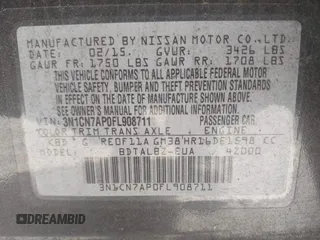 2015 Nissan Versa SV with VIN 3N1CN7AP0FL908711, listed as a IAAI auction lot 42200288 with 157,615 mi miles. Bid and sale history available at carsss.com. Image 9.