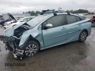 2020 Toyota Prius LE z VIN JTDL9RFUXL3013391, wystawiony jako Copart lot #62634605 z przebiegiem Nie podano mil oraz Szkoda całkowita • Salvage title. Historia ofert i sprzedaży dostępna na DreamBid. Obrazek 1.