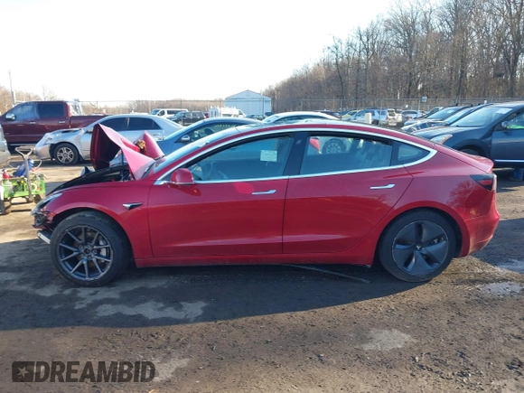2018 Tesla Model 3 Long Range Battery with VIN 5YJ3E1EB4JF065581, listed as a IAAI auction lot 41542190 with 4,154 mi miles and . Bid and sale history available at DreamBid. Image 13.