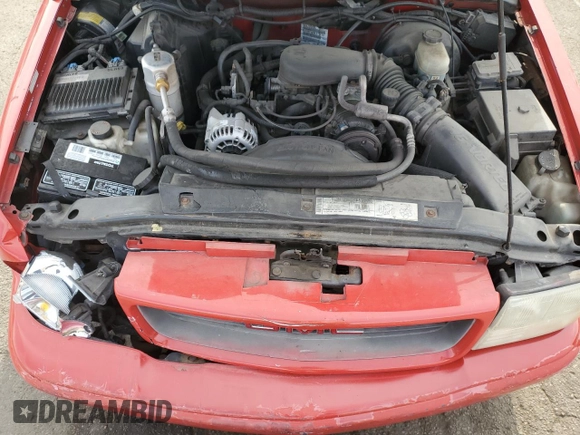 2000 GMC Sonoma SLS z VIN 1GTCS19W1Y8114591, wystawiony jako Copart lot #70182694 z przebiegiem 182 093 mil mil oraz Szkody całkowita. Historia ofert i sprzedaży dostępna na DreamBid. Obrazek 11.