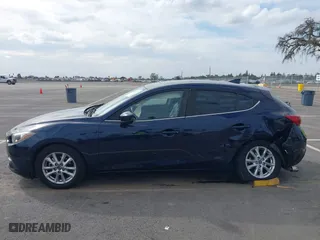 2016 Mazda Mazda3 i Grand Touring with VIN JM1BM1N74G1319656, listed as a IAAI auction lot 41561603 with 123,610 mi miles. Bid and sale history available at carsss.com. Image 14.