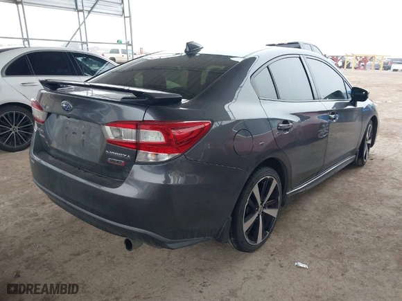 2018 Subaru Impreza Sport with VIN 4S3GKAM67J3618879, listed as a IAAI auction lot 41431925 with 84,673 mi miles. Bid and sale history available at carsss.com. Image 4.