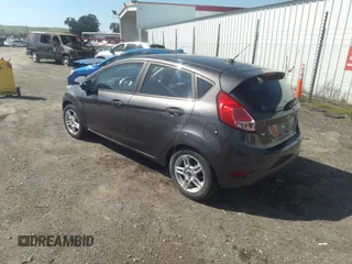 2018 Ford Fiesta SE with VIN 3FADP4EJ0JM141953, listed as a IAAI auction lot 38529613 with 74,502 mi miles and . Bid and sale history available at DreamBid. Image 3.