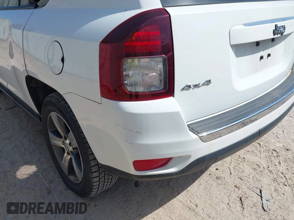 2016 Jeep Compass High Altitude with VIN 1C4NJDEB4GD767731, listed as a IAAI auction lot 41977400 with 99,890 mi miles and . Bid and sale history available at DreamBid. Image 21.