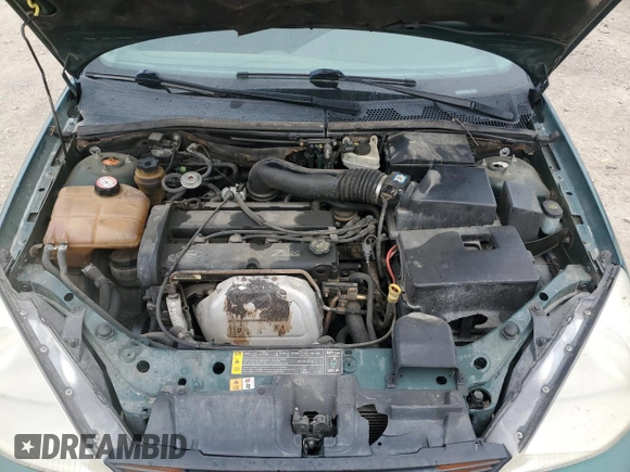2000 Ford Focus SE z VIN 1FAFP3438YW379761, wystawiony jako Copart lot #58156125 z przebiegiem 103 816 mil mil oraz Szkoda całkowita • Salvage title. Historia ofert i sprzedaży dostępna na DreamBid. Obrazek 11.