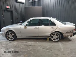 2002 Mercedes-Benz E-Class with VIN WDBJF82J52X062526, listed as a IAAI auction lot 41192641 with 126,352 mi miles. Bid and sale history available at carsss.com. Image 14.