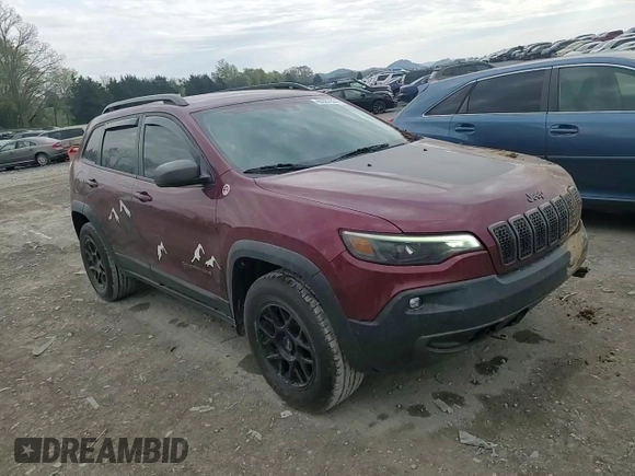 2019 Jeep Cherokee Trailhawk Elite z VIN 1C4PJMBN7KD211588, wystawiony jako Copart lot #49307824 z przebiegiem 54 781 mil mil oraz Szkoda całkowita • Salvage title. Historia ofert i sprzedaży dostępna na DreamBid. Obrazek 11.