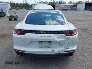 2018 Porsche Panamera 4 E-Hybrid with VIN WP0AE2A74JL130540, listed as a IAAI auction lot 42078444 with 65,981 mi miles and . Bid and sale history available at DreamBid. Image 6.