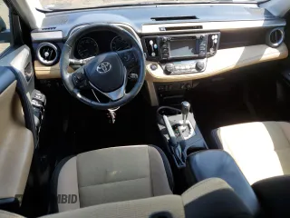 2018 Toyota RAV4 XLE with VIN 2T3RFREVXJW841741, listed as a Copart auction lot 51378385 with 114,842 mi miles and Salvage Title. Bid and sale history available at carsss.com. Image 8.