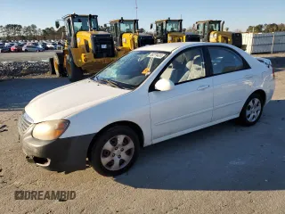 2009 Kia Spectra EX z VIN KNAFE222395623700, wystawiony jako Copart lot #86279424 z przebiegiem 195 991 mil mil oraz Szkoda całkowita • Salvage title. Historia ofert i sprzedaży dostępna na DreamBid. Obrazek 1.