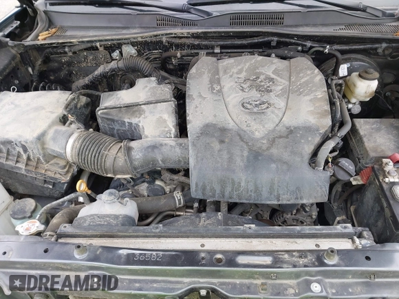 2021 Toyota Tacoma SR5 with VIN 3TMDZ5BN1MM119711, listed as a IAAI auction lot 42479038 with 64,779 mi miles and . Bid and sale history available at DreamBid. Image 10.