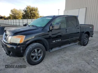2015 Nissan Titan SL with VIN 1N6BA0EC1FN508172, listed as a Copart auction lot 86518404 with 102,062 mi miles and Salvage Title. Bid and sale history available at carsss.com. Image 1.