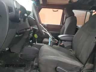2016 Jeep Wrangler Unlimited Sport z VIN 1C4BJWDG4GL194296, wystawiony jako Copart lot #59397285 z przebiegiem 174 343 mil mil oraz Szkoda całkowita • Salvage title. Historia ofert i sprzedaży dostępna na DreamBid. Obrazek 7.
