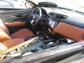 2017 Nissan Rogue SV with VIN 5N1AT2MV5HC858874, listed as a IAAI auction lot 41860634 with Not Provided miles. Bid and sale history available at carsss.com. Image 5.