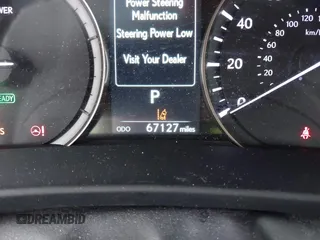 2020 Lexus RX 450h with VIN 2T2JGMDA7LC051477, listed as a IAAI auction lot 42484984 with 67,127 mi miles and . Bid and sale history available at DreamBid. Image 16.