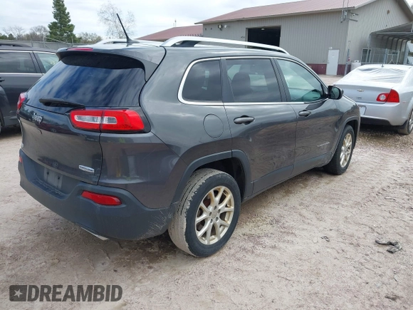 2015 Jeep Cherokee Latitude with VIN 1C4PJLCS9FW542181, listed as a IAAI auction lot 42183167 with 144,607 mi miles and . Bid and sale history available at carsss.com. Image 4.