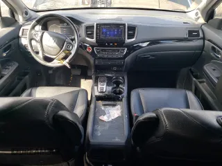 2017 Honda Pilot Touring with VIN 5FNYF6H90HB028112, listed as a Copart auction lot 52197645 with 218,944 mi miles and Salvage Title. Bid and sale history available at DreamBid. Image 8.