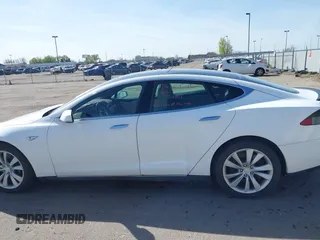 2014 Tesla Model S P85D with VIN 5YJSA1H20EFP63761, listed as a IAAI auction lot 41980472 with 109,164 mi miles and . Bid and sale history available at DreamBid. Image 14.