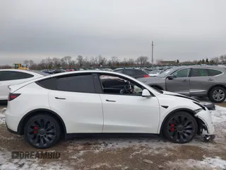 2021 Tesla Model Y Performance with VIN 5YJYGDEF6MF261711, listed as a IAAI auction lot 41176208 with 25,687 mi miles and . Bid and sale history available at DreamBid. Image 13.