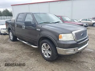 2005 Ford F-150 XLT with VIN 1FTPW12565FA57173, listed as a IAAI auction lot 41872194 with 286,812 mi miles. Bid and sale history available at carsss.com. Image 1.