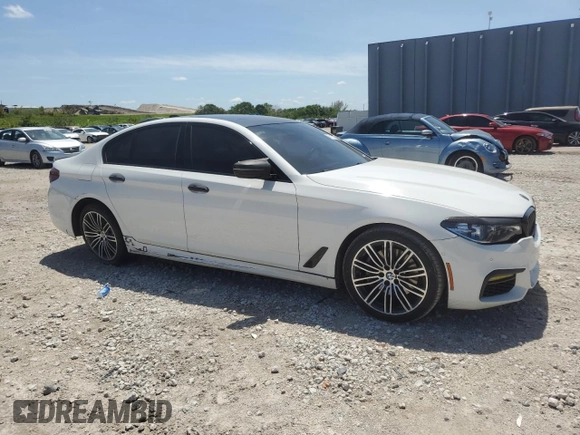 2018 BMW 5 Series 540i with VIN WBAJE5C58JWA96615, listed as a Copart auction lot 56117205 with 87,211 mi miles and Salvage title. Bid and sale history available at DreamBid. Image 4.