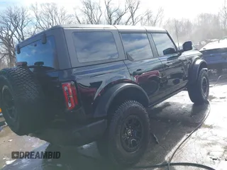 2023 Ford Bronco with VIN 1FMEE5DP9PLB82362, listed as a IAAI auction lot 41443809 with 13,567 mi miles and . Bid and sale history available at DreamBid. Image 4.