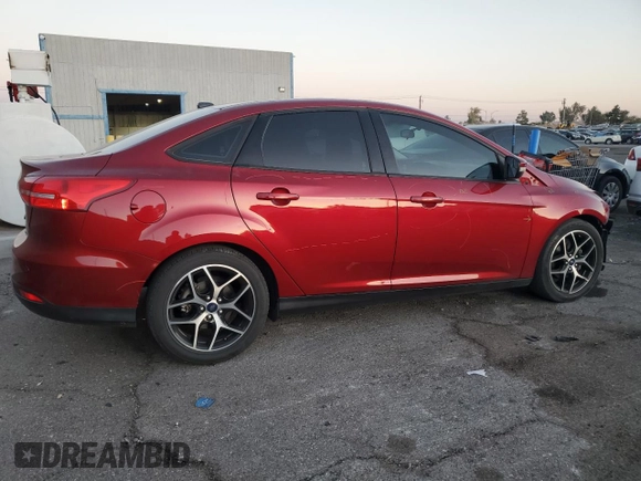 2017 Ford Focus SEL with VIN 1FADP3H2XHL258305, listed as a Copart auction lot 43835715 with 82,419 mi miles and Salvage Title. Bid and sale history available at carsss.com. Image 3.