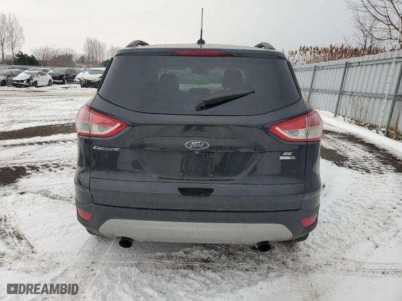 2015 Ford Escape SE with VIN 1FMCU9GXXFUB84143, listed as a Copart auction lot 42494185 with 292,439 mi miles and Salvage Title. Bid and sale history available at carsss.com. Image 6.