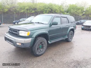 2000 Toyota 4Runner SR5 with VIN JT3HN86R9Y0294975, listed as a IAAI auction lot 41985007 with 218,761 mi miles. Bid and sale history available at carsss.com. Image 2.