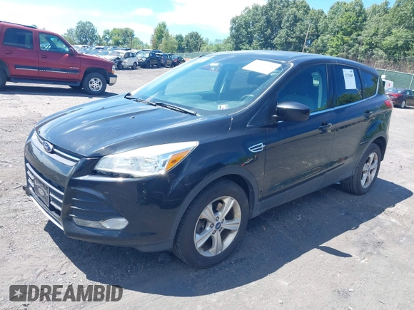 2014 Ford Escape SE with VIN 1FMCU9GX9EUA18422, listed as a IAAI auction lot 42765689 with 153,235 mi miles and . Bid and sale history available at DreamBid. Image 2.
