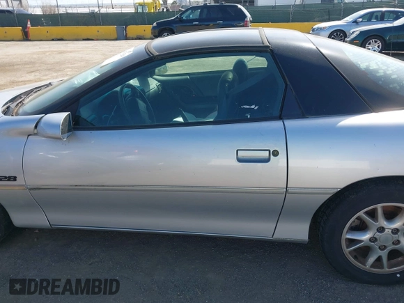 2002 Chevrolet Camaro Z28 z VIN 2G1FP22G722167574, wystawiony jako IAAI lot #41976510 z przebiegiem 114 863 mil mil oraz . Historia ofert i sprzedaży dostępna na DreamBid. Obrazek 14.