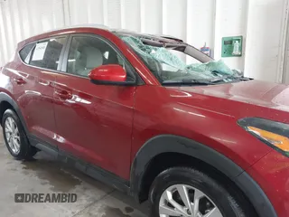 2021 Hyundai Tucson Value with VIN KM8J33A44MU363524, listed as a IAAI auction lot 41854508 with 59,821 mi miles. Bid and sale history available at carsss.com. Image 13.