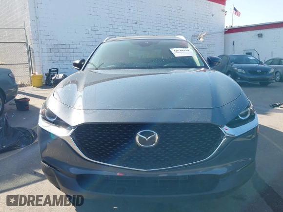 2022 Mazda CX-30 S Carbon Edition with VIN 3MVDMBCL6NM431985, listed as a IAAI auction lot 42610558 with Not provided miles and . Bid and sale history available at DreamBid. Image 11.