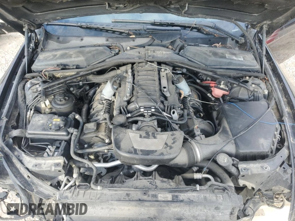 2007 BMW 6 Series 650i z VIN WBAEH13567CR51918, wystawiony jako Copart lot #76337784 z przebiegiem 135 313 mil mil oraz Szkoda całkowita • Salvage title. Historia ofert i sprzedaży dostępna na DreamBid. Obrazek 11.