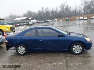 2003 Honda Civic LX with VIN 1HGEM22593L053072, listed as a IAAI auction lot 41555062 with 267,613 mi miles. Bid and sale history available at carsss.com. Image 13.