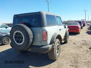 2023 Ford Bronco with VIN 1FMDE5CP0PLC17397, listed as a IAAI auction lot 41622763 with 21,799 mi miles. Bid and sale history available at carsss.com. Image 4.