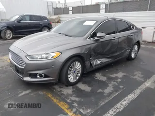 2013 Ford Fusion Titanium with VIN 3FA6P0SUXDR332271, listed as a IAAI auction lot 42174434 with 201,404 mi miles and . Bid and sale history available at DreamBid. Image 2.
