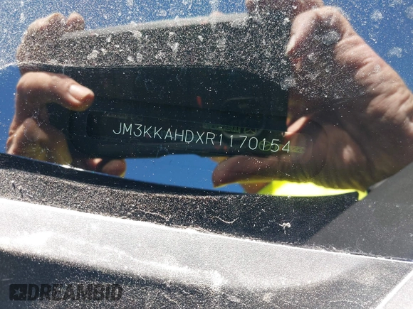2024 Mazda CX-90 Select z VIN JM3KKAHDXR1170154, wystawiony jako IAAI lot #40852871 z przebiegiem 4 498 mil mil oraz . Historia ofert i sprzedaży dostępna na DreamBid. Obrazek 9.