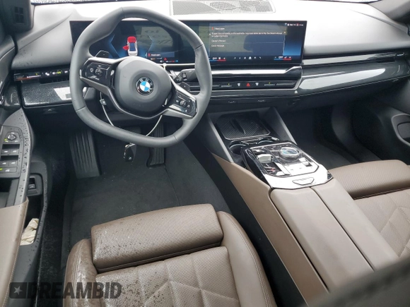 2024 BMW 5 Series 530i xDrive with VIN WBA53FJ01RCP97253, listed as a Copart auction lot 50888795 with 11,985 mi miles and Salvage title. Bid and sale history available at DreamBid. Image 8.
