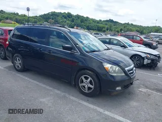 2007 Honda Odyssey Touring with VIN 5FNRL38817B080480, listed as a IAAI auction lot 42800713 with 232,519 mi miles and . Bid and sale history available at DreamBid. Image 1.
