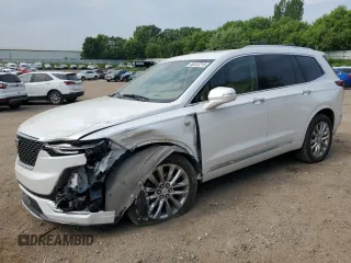 2021 Cadillac XT6 Premium Luxury с VIN 1GYKPFRS1MZ127086, выставлен на аукционе Copart как лот 60412215 с пробегом 73 234 миль миль и Списание • Salvage title. История ставок и продаж доступна на DreamBid. Изображение 1.