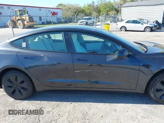 2025 Tesla Model 3 Long Range with VIN 5YJ3E1EA2SF910890, listed as a IAAI auction lot 41791583 with Not Provided miles and . Bid and sale history available at DreamBid. Image 12.